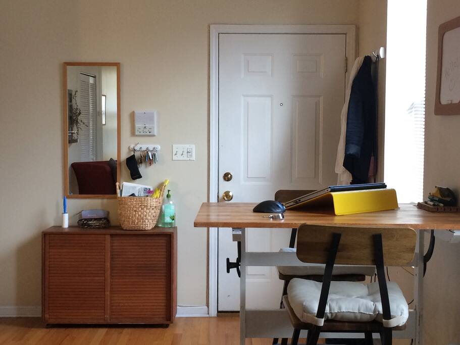 Entrance with shoe rack and coat hanging area