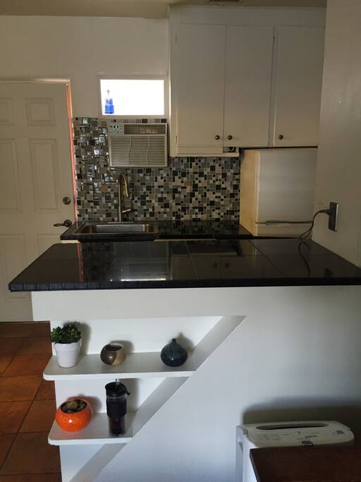 View of Kitchen and Bar