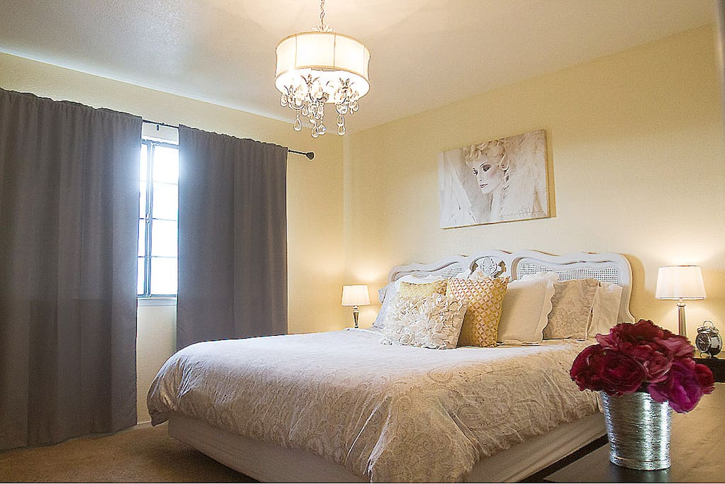 Our 'sunshine' king bedroom with pasture views of the sheep and goats.