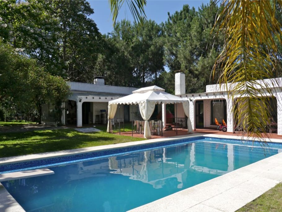 view from the pool to the guest house on the right hand side
