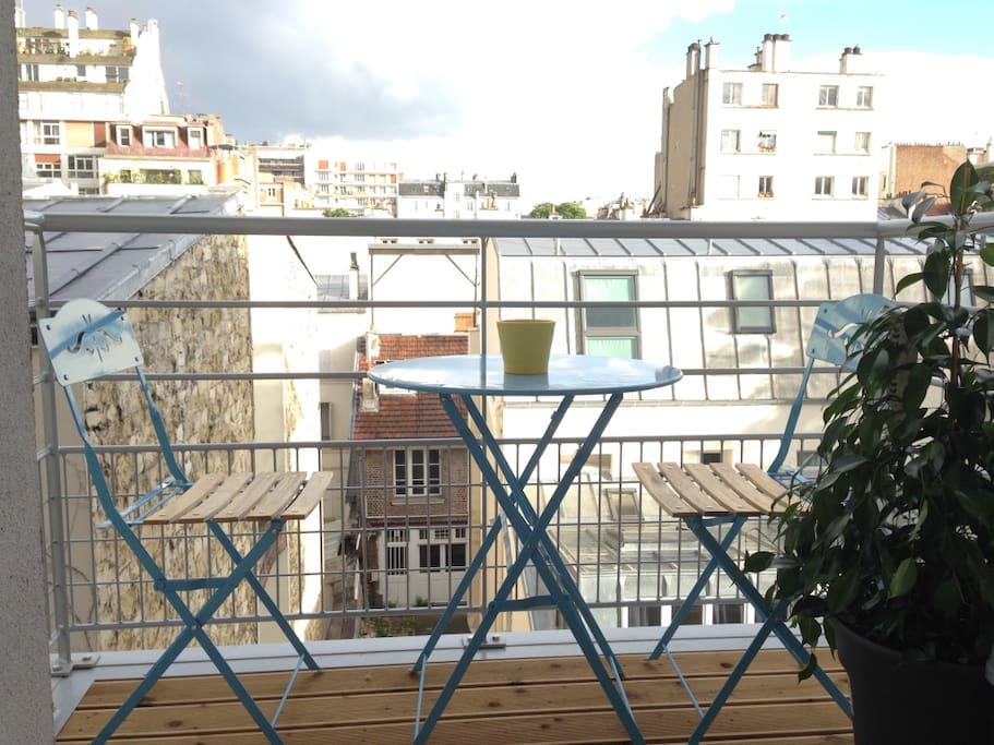 Balcony overlooking the roofs of Paris