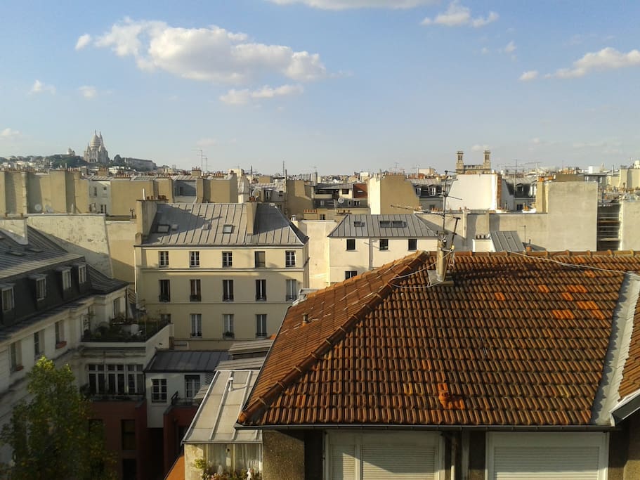 Immeuble avec belle vue de la butte de Montmartre et de l'église du Sacré Cœur