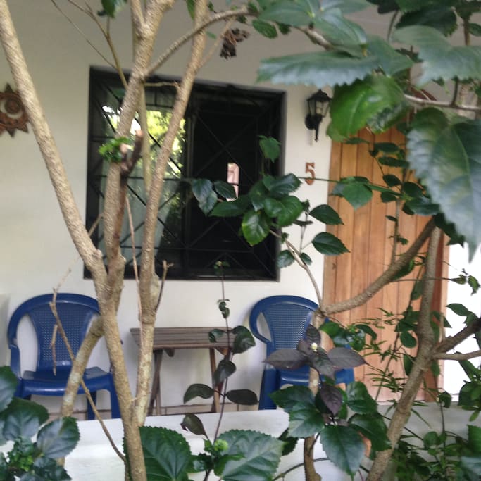Front porches in the garden are a nice shady place to relax in the afternoon