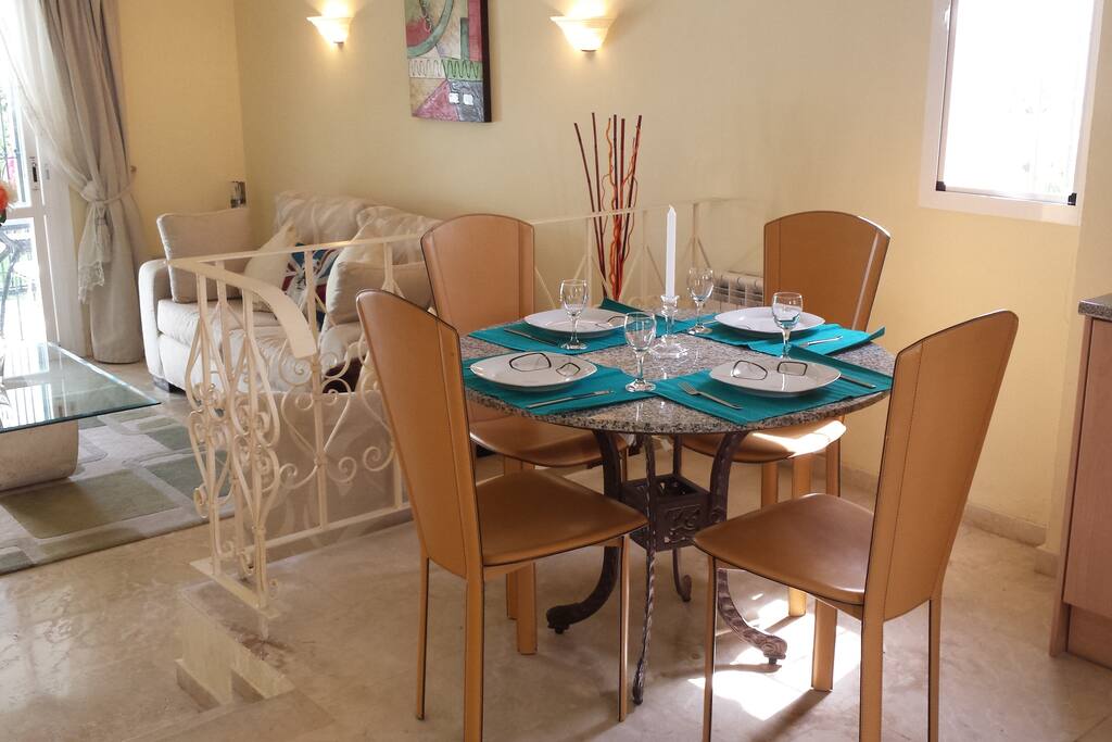 Open plan living area with fully fitted kitchen