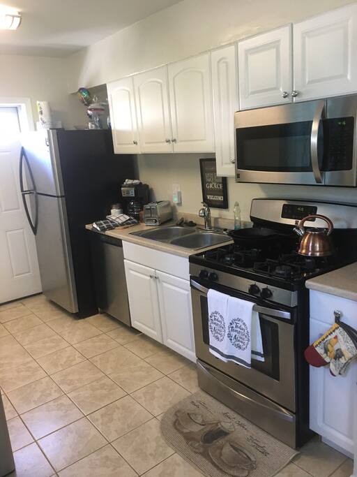 Clean Modern Kitchen fully stocked