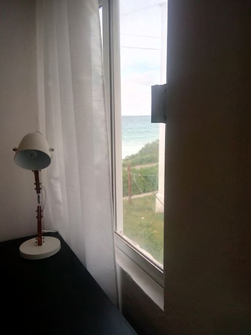 View of the beautiful Isla Mujeres Sea from your bedroom. Wake up to the waves and breeze in paradise.