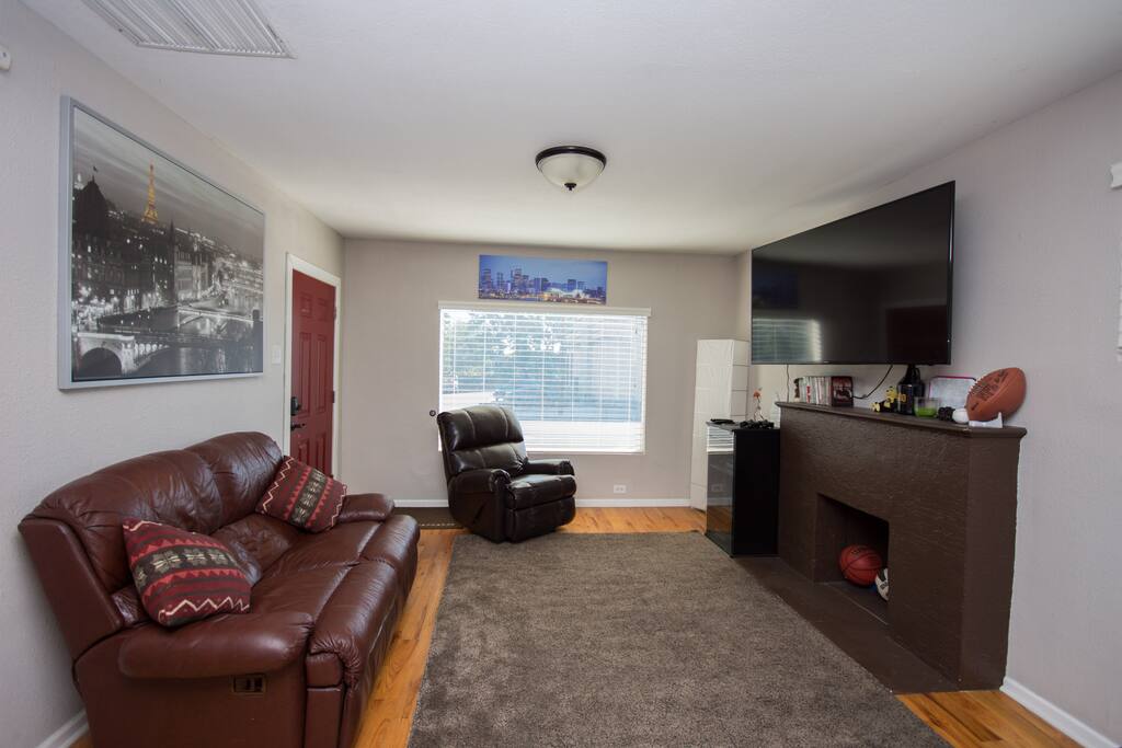 Super comfy living room with a 60" TV. Cable Included!