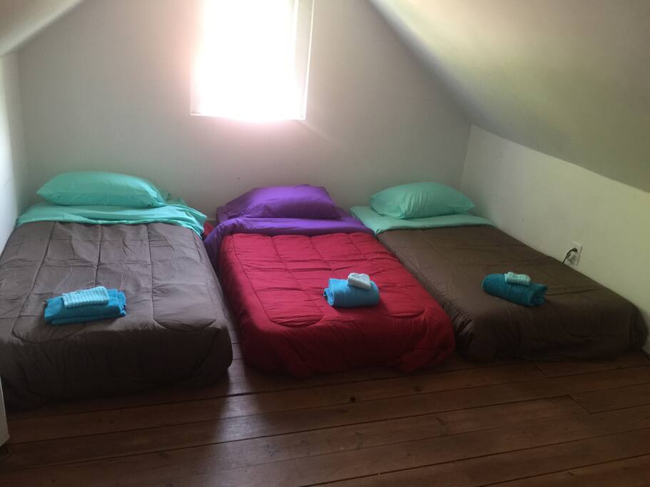 Another view of 3 thick comfy twin sized mattresses