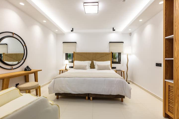 Master bedroom which features two single beds that are joined to create a King size bed 1,80 x 2,00