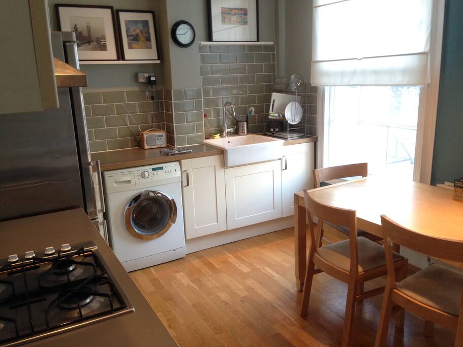 Large kitchen with dining area.