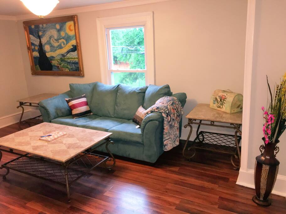 Relax in the living room, which comes with a sofa bed for two.