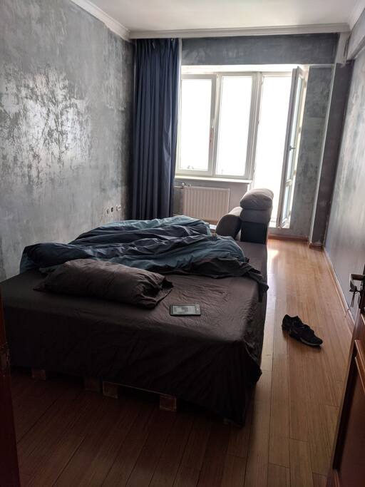 bedroom with a balcony