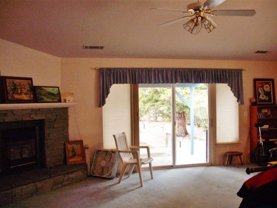 Living room opens to backyard.