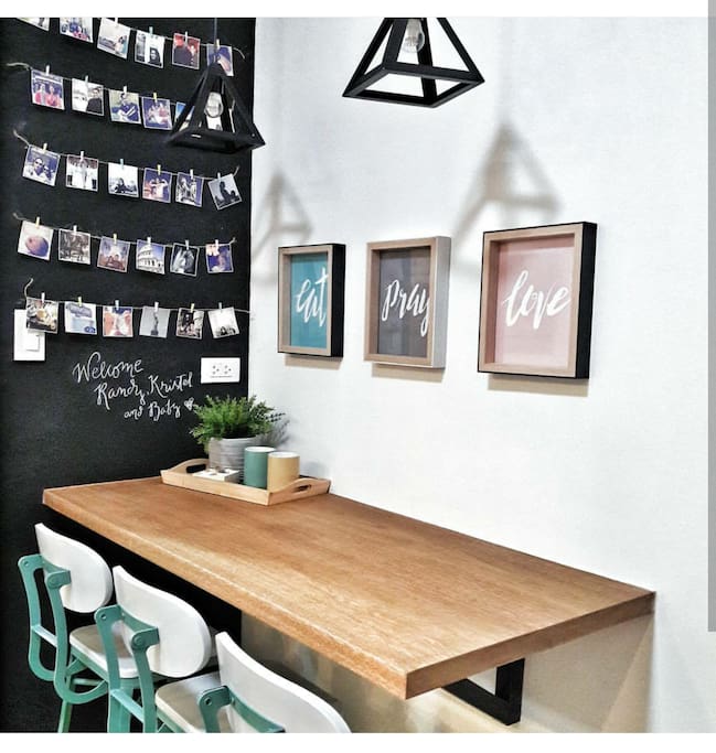 Wall mounted table with elegant breakfast chairs