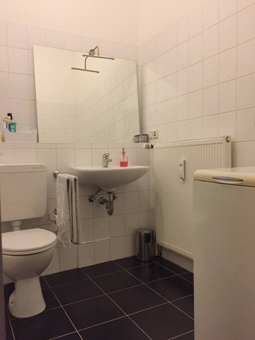 Not the most modern bath room but it has it's own charme I guess. You can take a shower or a bath. There is also a washing machine.