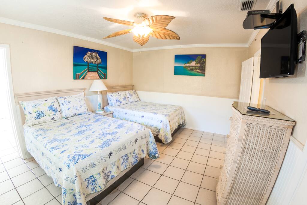 Spacious bedroom with 2 Memory Foam Double Beds and a Flat Screen HDTV with Comcast Xfininty.