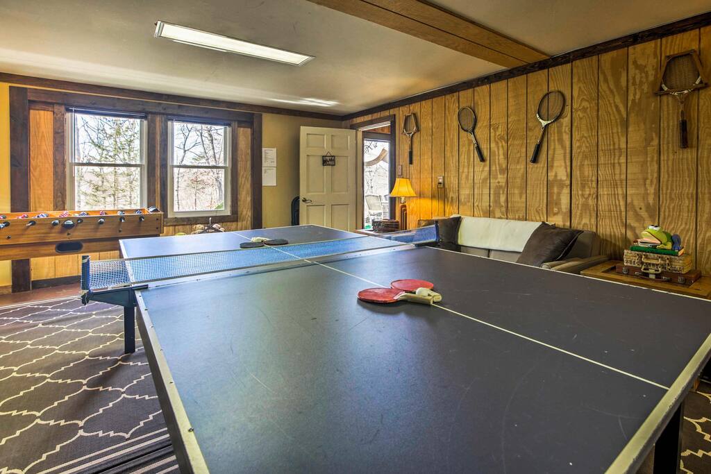 This rustic 3,200-square-foot home sleeps 19 and offers a rec room, a spacious patio, an outdoor fire pit and much more!
