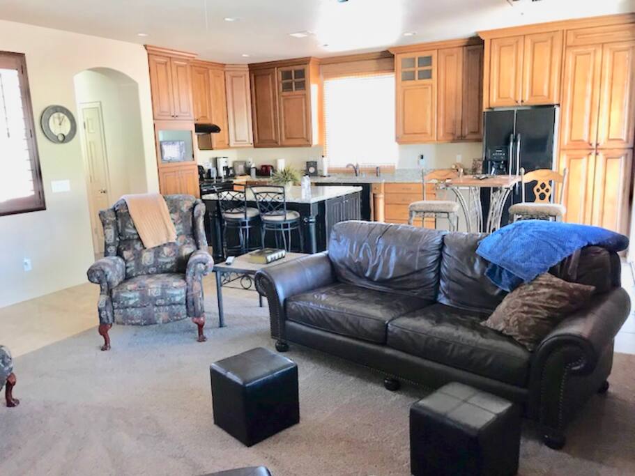 Additional view of family room and kitchen.