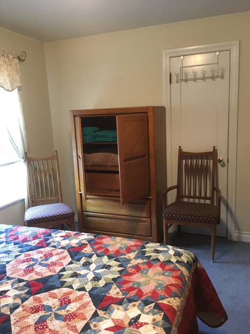 Your selection of towels and extra blankets plus place to store your things and hooks to hang your hat and whatever else.