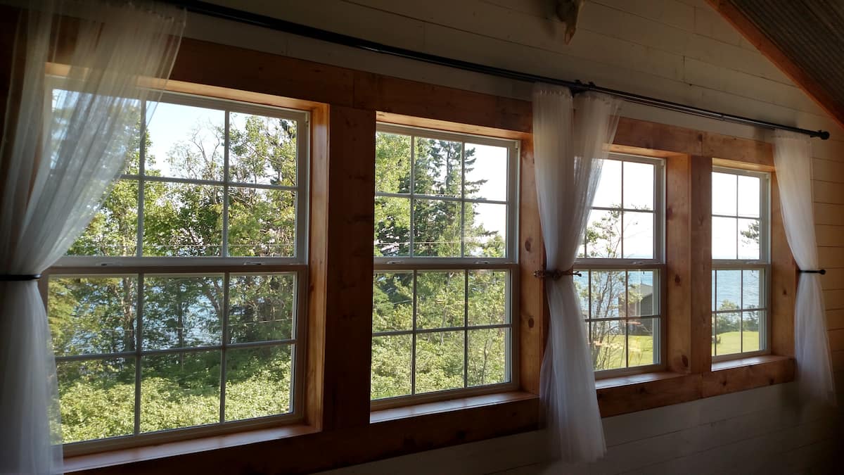 Wall of windows at Loftville looking out at Lake Superior