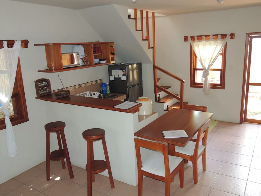 First floor with a small living room and kitchen