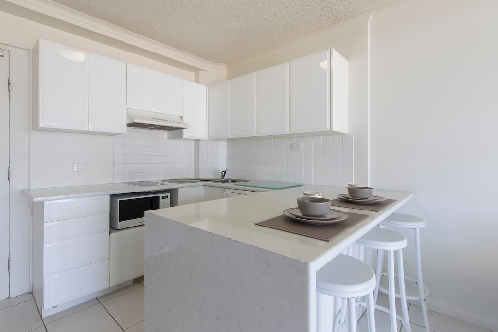 Breakfast bar in the kitchen. Plenty of counter space.