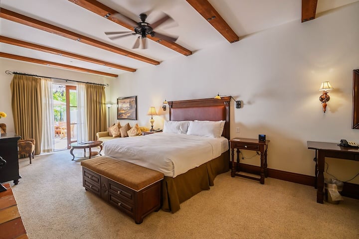 Beautiful, open bedroom space with king size bed.