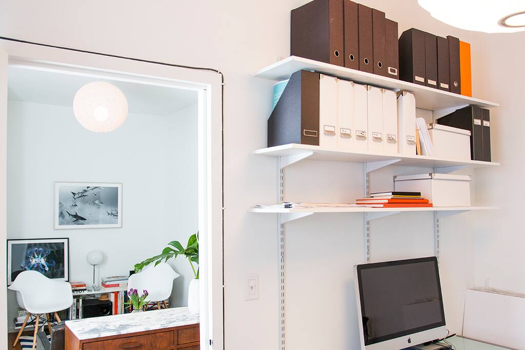office space with large desk.