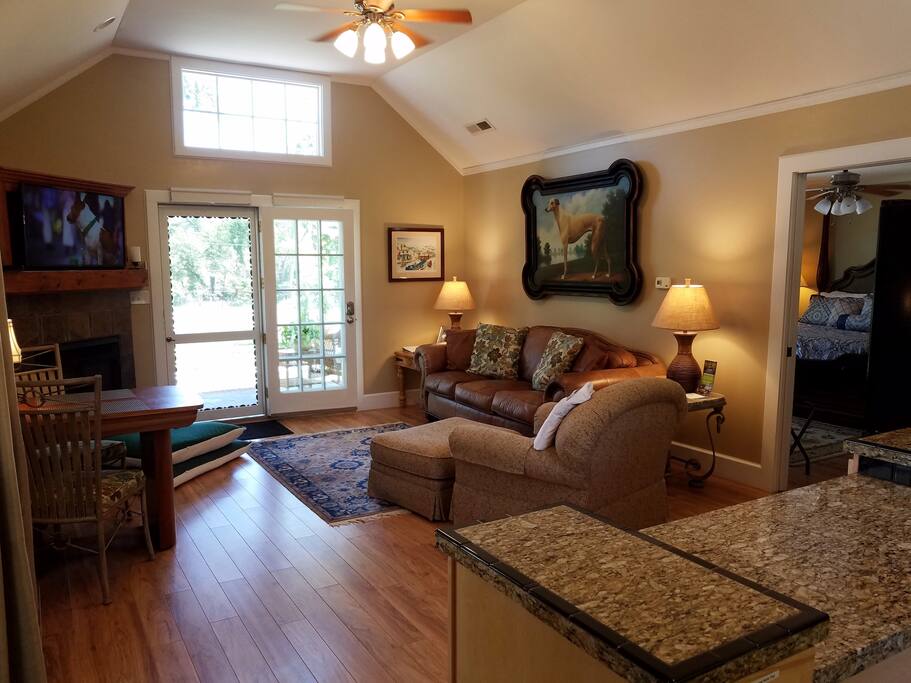 Enjoy cushy furniture for you and orthopedic beds for your dogs so everyone can relax in front of the smart tv and gas fireplace