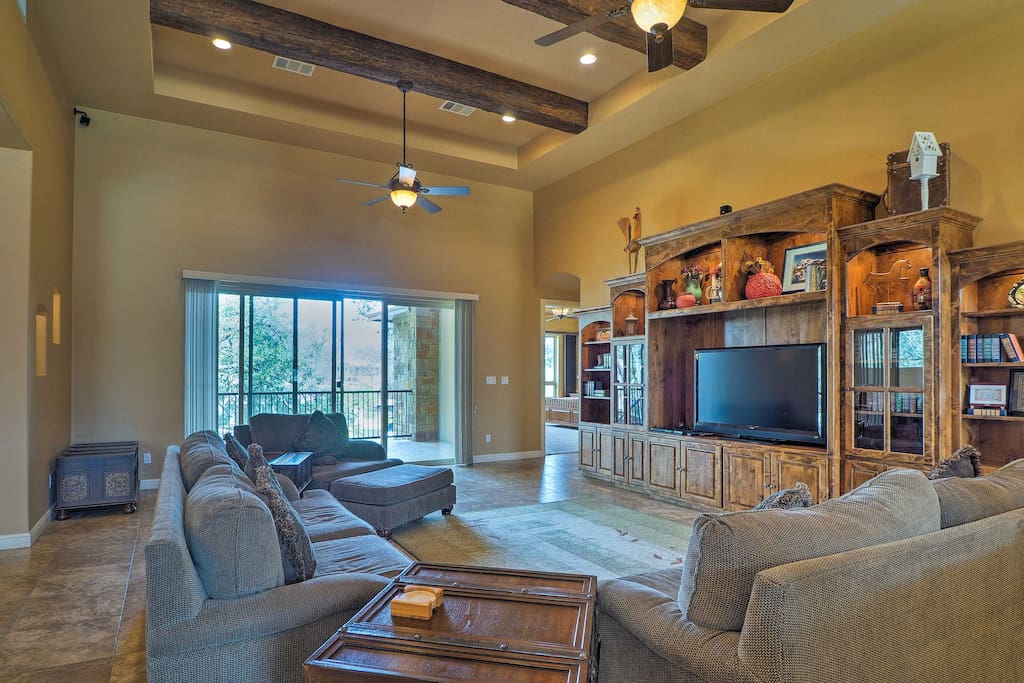 Sit back on the plush furnishings and watch the flat-screen cable TV.