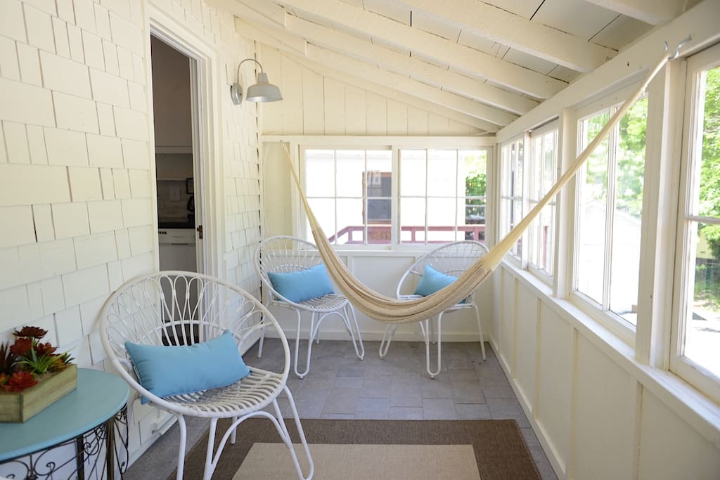 Enjoy the sun in the enclosed porch.