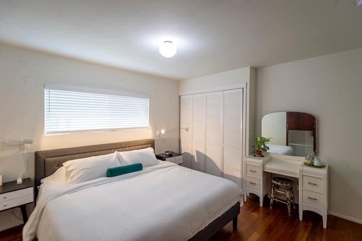 Bedroom 2 with King Bed and dressing table. 