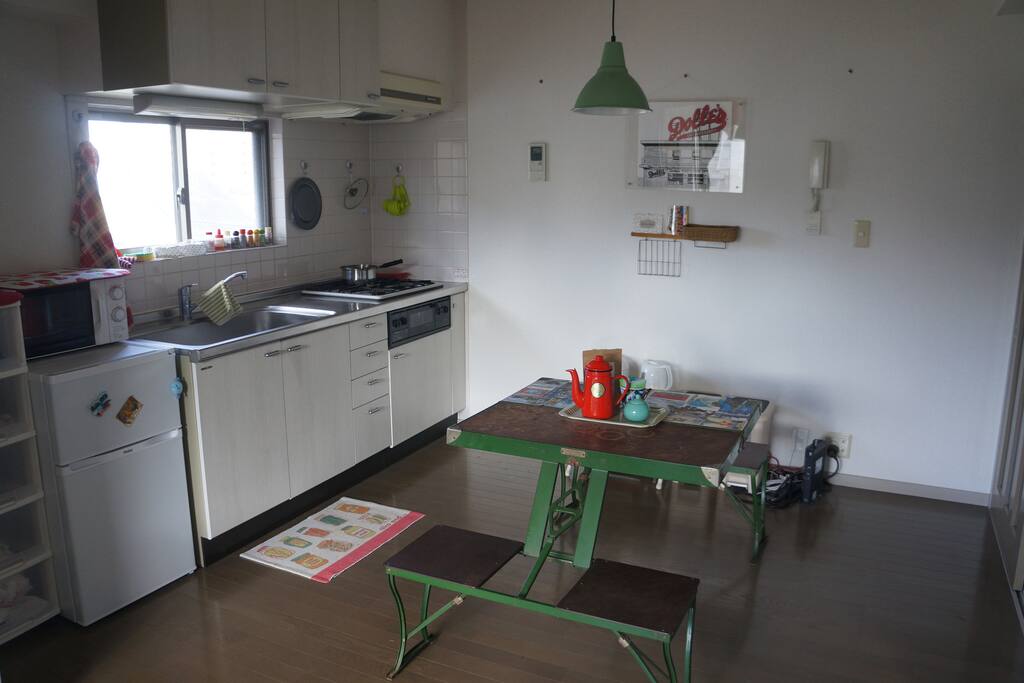 Full Kitchen with fridge, microwave, toaster oven, tea kettle, and rice cooker. Gas stove, 3 burners.