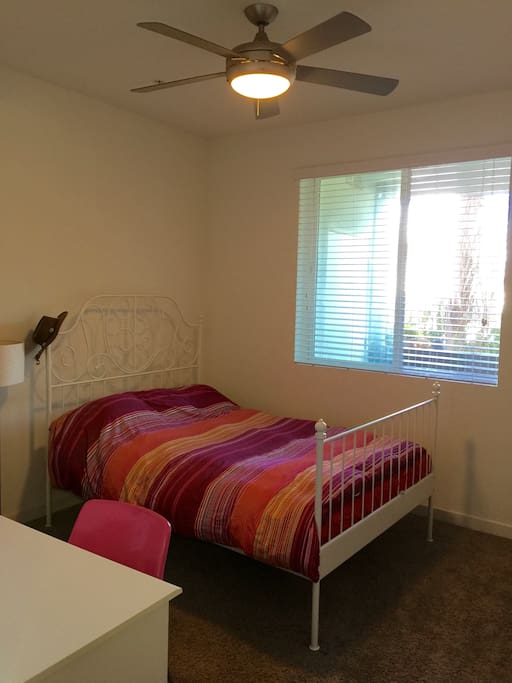 A bright room with queen bed! Good for two people.