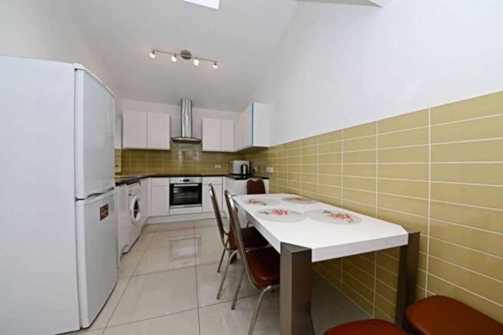 Kitchen/Living Room with washing machine