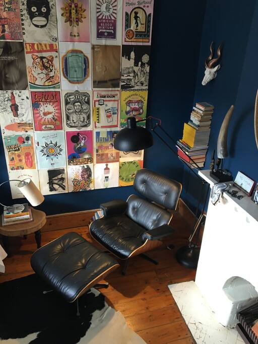 Reading chair next to private fireplace