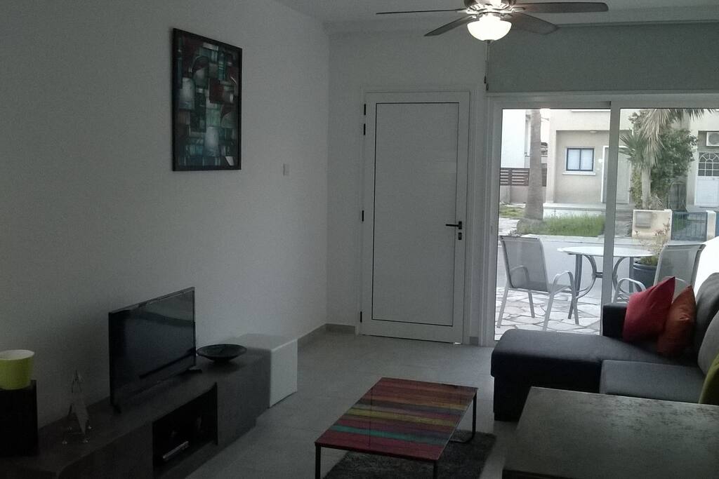 open plan lounge with large patio dors