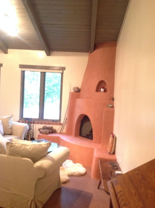 Wood burning custom Kiva fireplace.