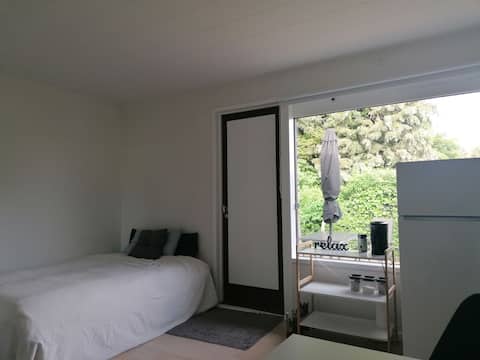 Successful Airbnb property: Cozy guest suite with private garden, close to Herlev station. in Brønshøj Husum