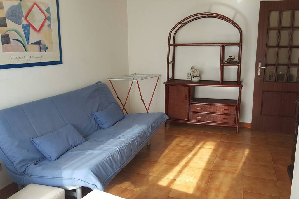 Sala com o sofá cama