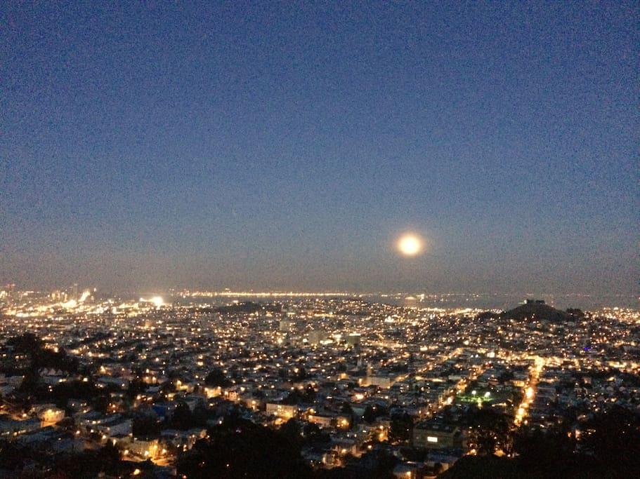 At night the moon rises and the planes line up in the distance for SFO and Oakland airports