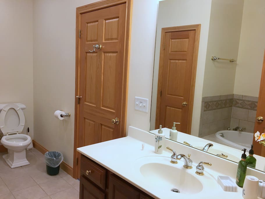 Attached bath with soaking tub and shower