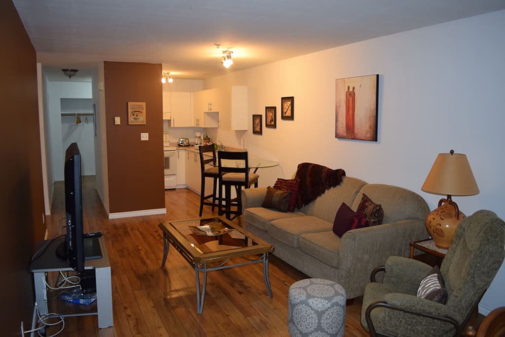 Living room with 52" TV, tons of channels and very high-speed Wifi Internet