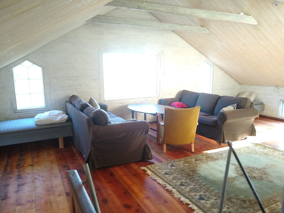 The living room with the window east. Where there's a lake view.