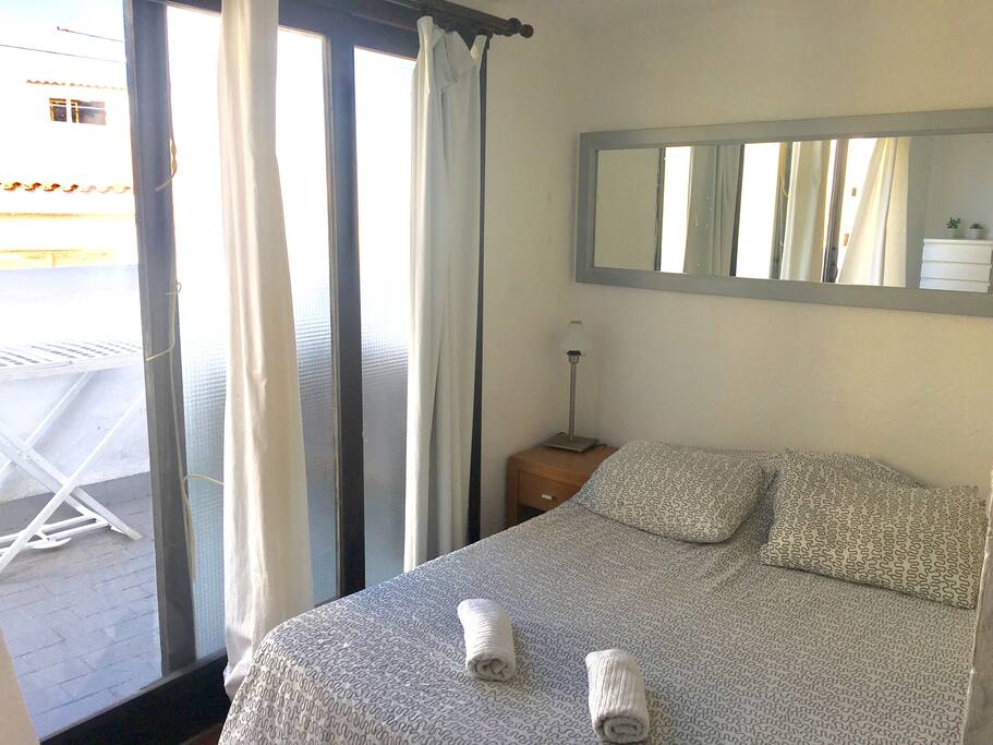 a double bed with its own private terrace