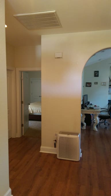 View from the front door looking in. Your room is ahead on the left.