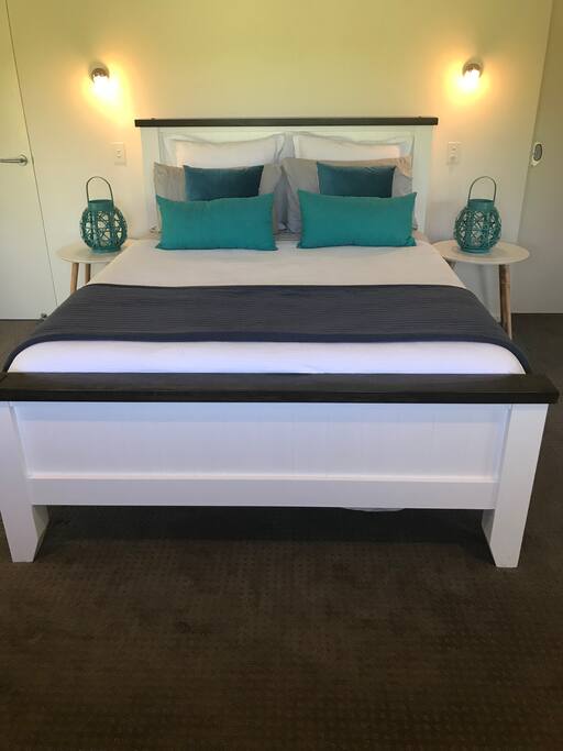 Master queen bedroom with walk in wardrobe and farm views over the pony paddock