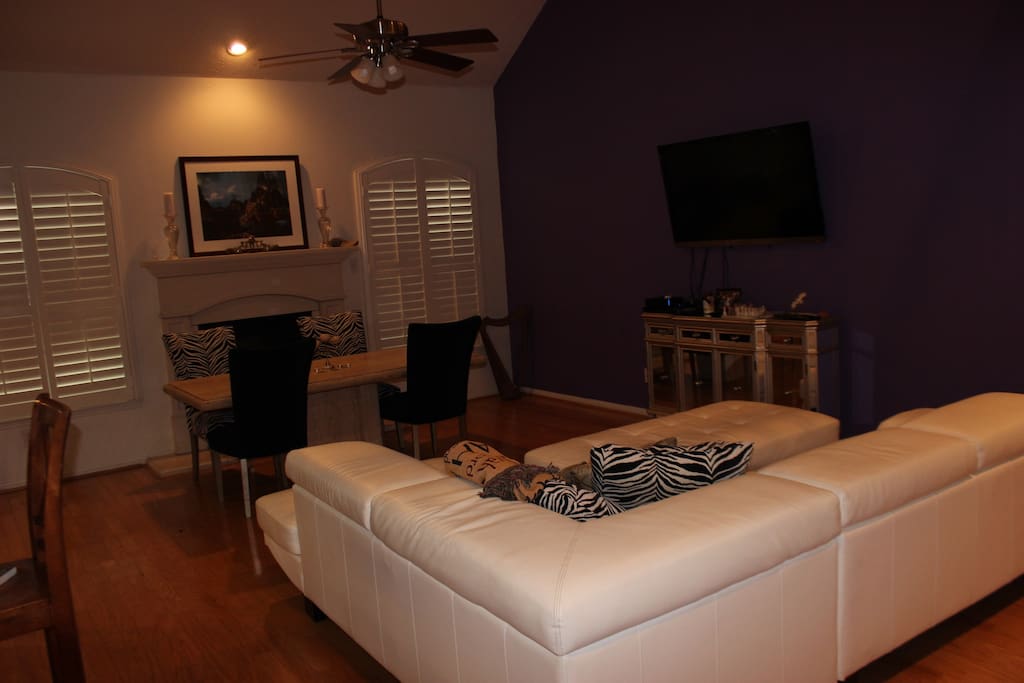 Living room couch and dining table