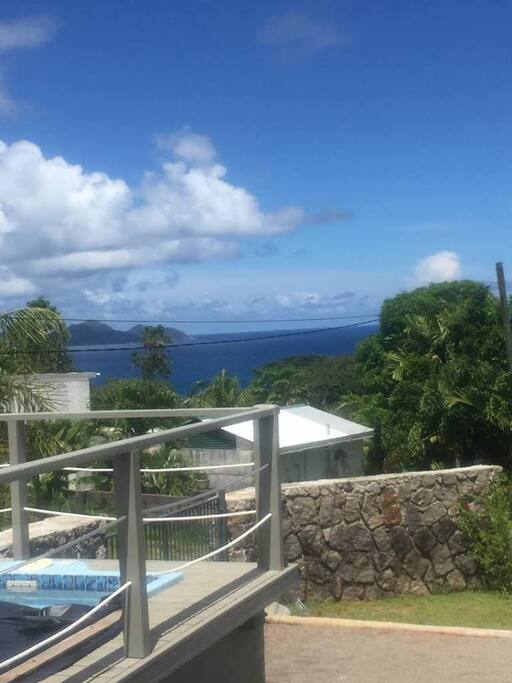 The view from the living room, terrace and pool