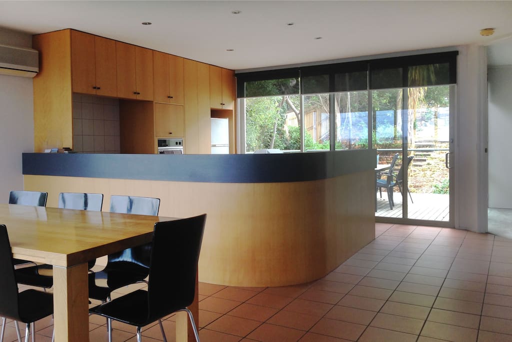 Chef's Kitchen, really well appointed with Oven, Gas Cook top, Micro & Dishwasher looking to Back Deck